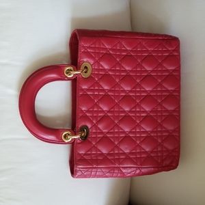 Women's Ashneil purse in red Napa leather with gold hardware.